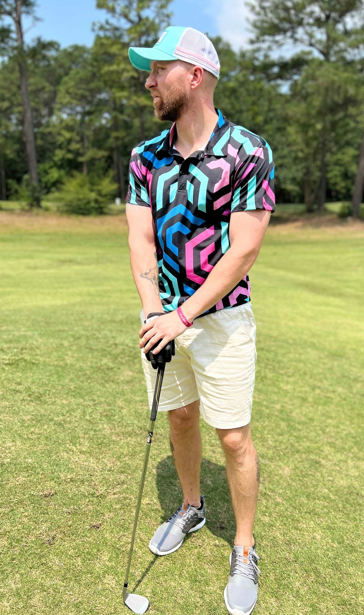 Pink, black and blue golf shirt with hexagonal pattern. black golf polo. blue golf polo. cheap golf shirts for men