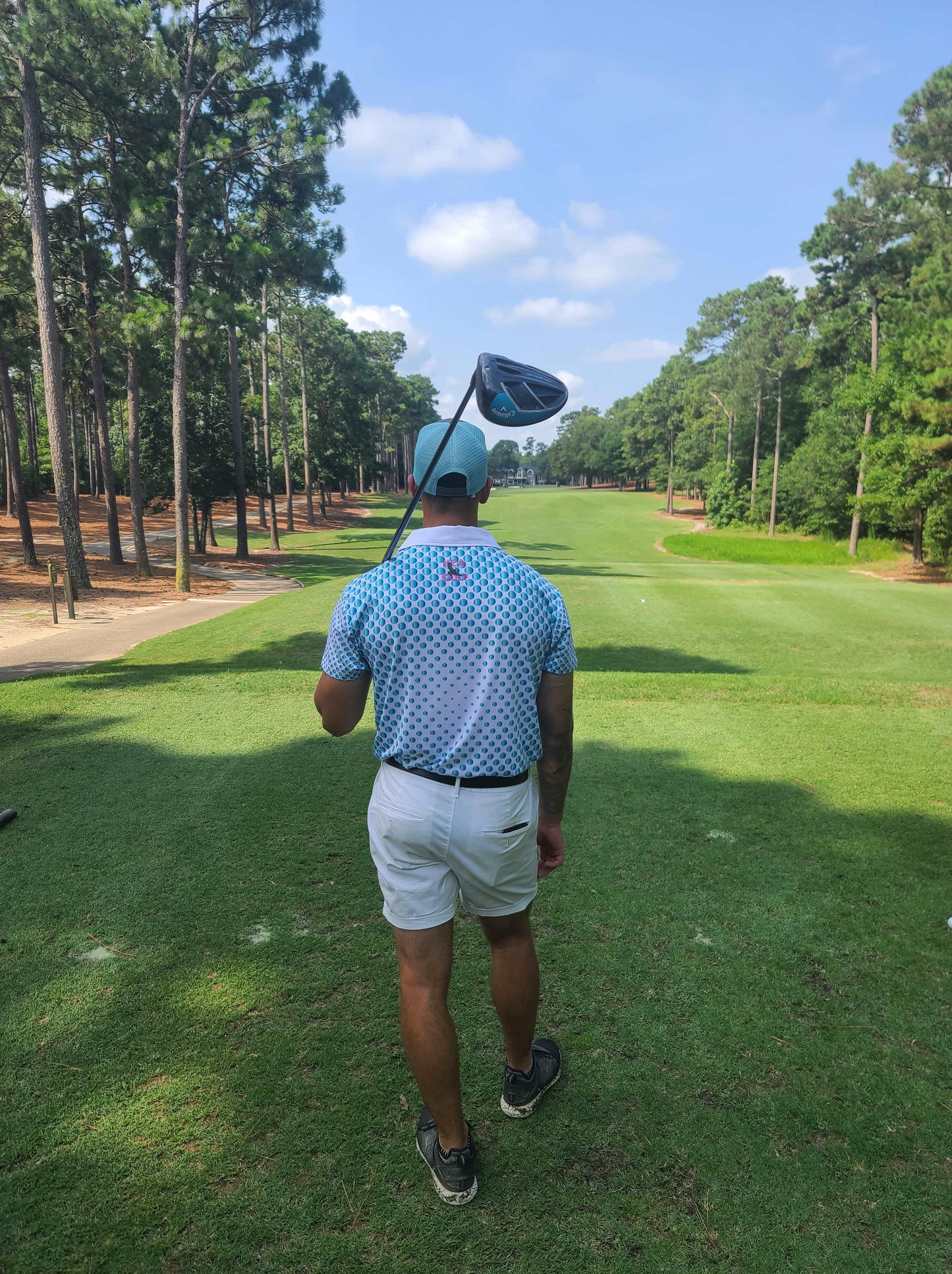 KEA Golf Men's Golf Hat "Blue Horizon" trucker style golf hat with mesh backing shown with Spot-on Birdie golf shirt