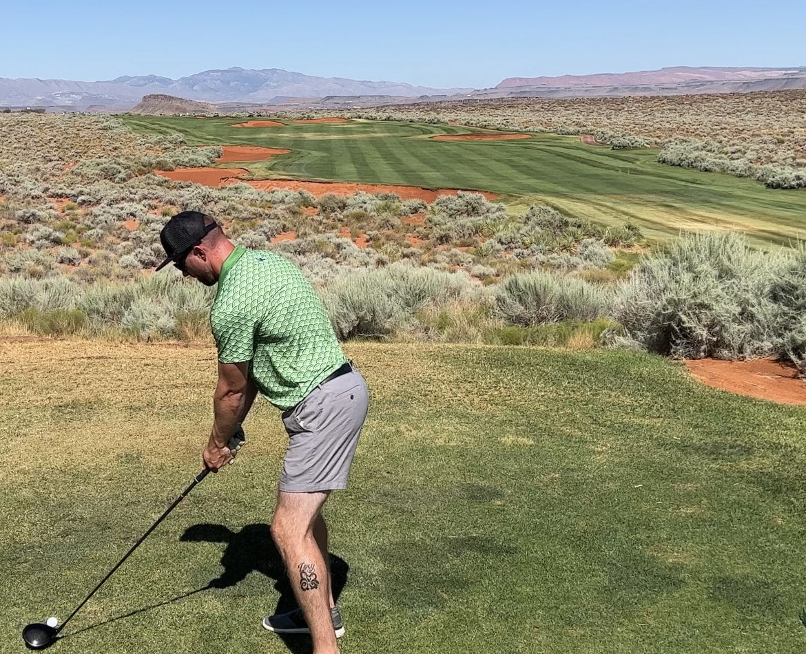KEA Golf Shirt with desert golf background. Golf Shirt. Custom Golf shirts for golf tournaments. green golf shirt