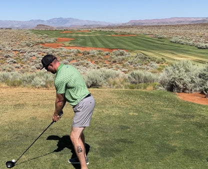KEA Golf Shirt with desert golf background. Golf Shirt. Custom Golf shirts for golf tournaments. green golf shirt