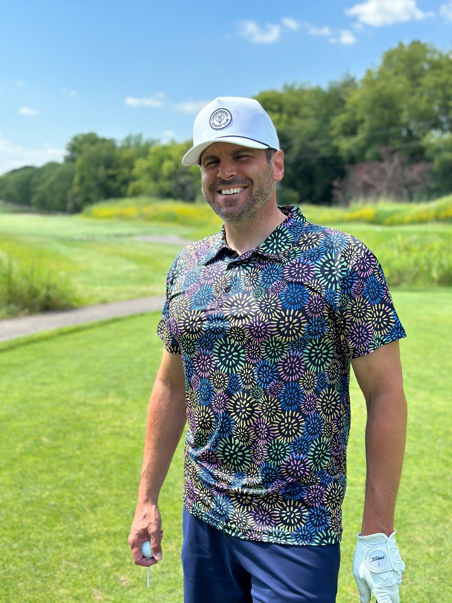 Independent Golf reviewer wearing the "dandelion drive" golf shirt by KEA Golf on the golf course