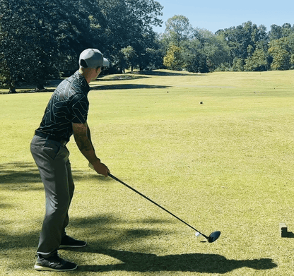 Cyan and Black golf shirt with geometric pattern. cheap golf shirts. black golf polo. black golf shirt